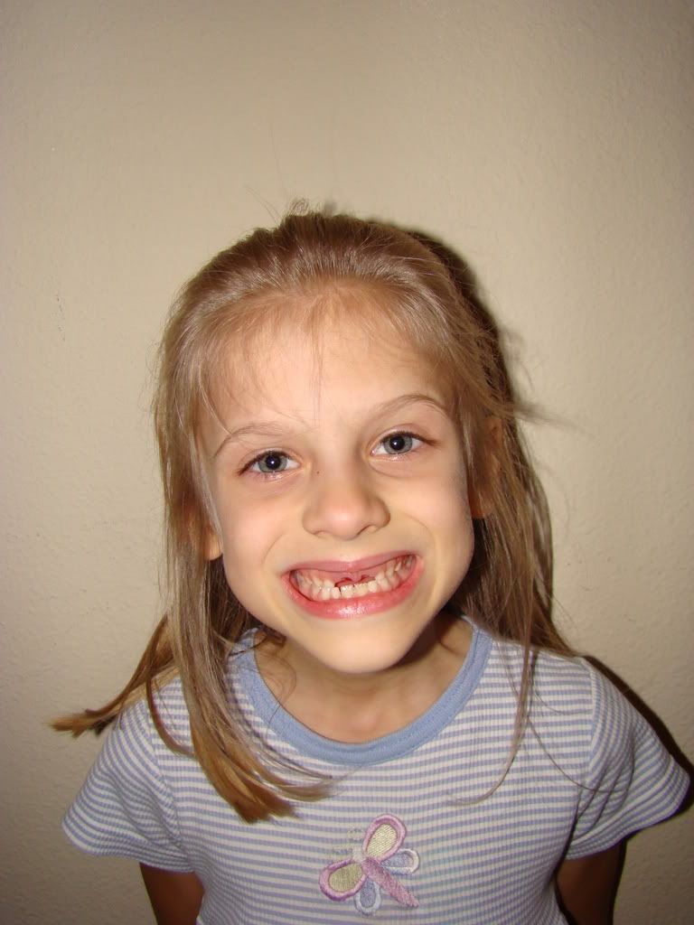Larissa lost her 4th tooth - 6/08