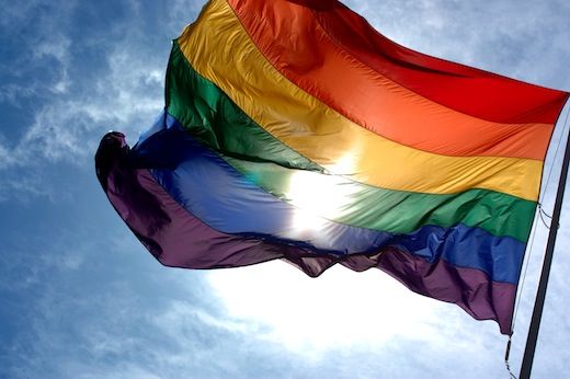 photo Rainbow_flag_and_blue_skies_zps7b76f368.jpg