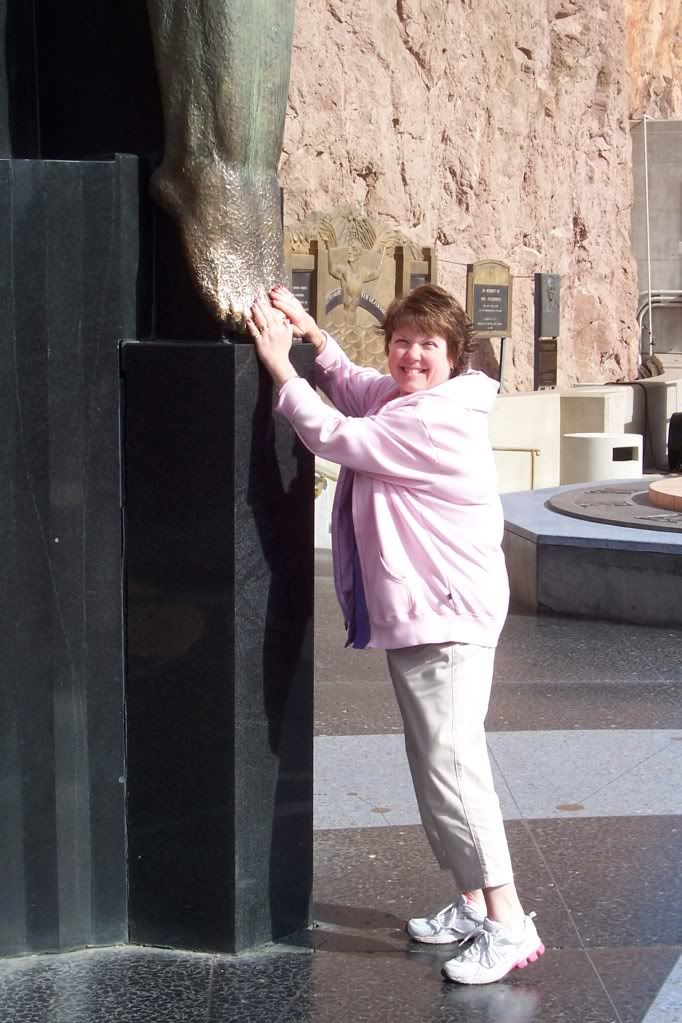 Rubbing the &quot;Good Luck feet&quot; at Hoover Dam